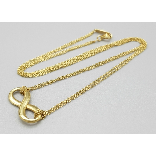 110 - A Tiffany and Co 18k yellow gold infinity necklace, 4.5g total weight, 16” chain length in original ... 