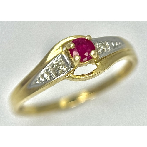 144 - A 9K Yellow Gold Ruby and Diamond Crossover Ring. Size P 1/2. 1.55g.