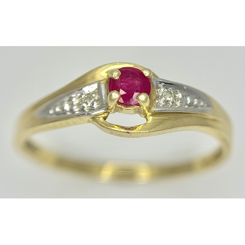 144 - A 9K Yellow Gold Ruby and Diamond Crossover Ring. Size P 1/2. 1.55g.