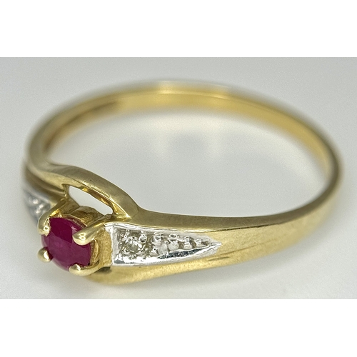 144 - A 9K Yellow Gold Ruby and Diamond Crossover Ring. Size P 1/2. 1.55g.