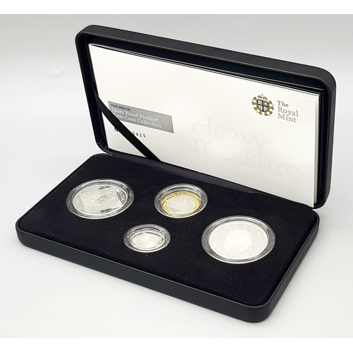 148 - A Royal Mint Silver Proof Piedfort Four-Coin Collection. Elizabeth I £5 - 56.56g, Prince Charles - £... 