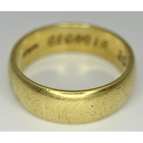 164 - An 18K Yellow Gold Band Ring. 8mm width. Size T. 8.75g.