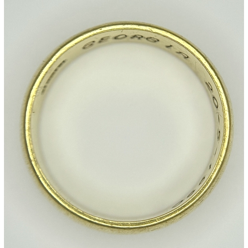 164 - An 18K Yellow Gold Band Ring. 8mm width. Size T. 8.75g.