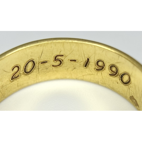 164 - An 18K Yellow Gold Band Ring. 8mm width. Size T. 8.75g.