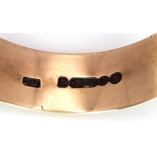 38 - A 9K Yellow Gold Band Ring. 7mm. Size R. 3.5g.