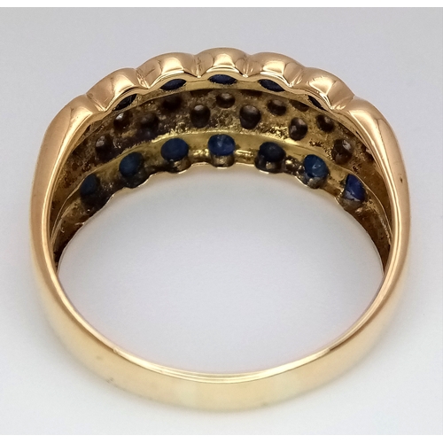 173 - AN 18K YELLOW GOLD DIAMOND AND SAPPHIRE SET RING. 0.40CT. 5.9G. SIZE S. REF - SPSA 4002.