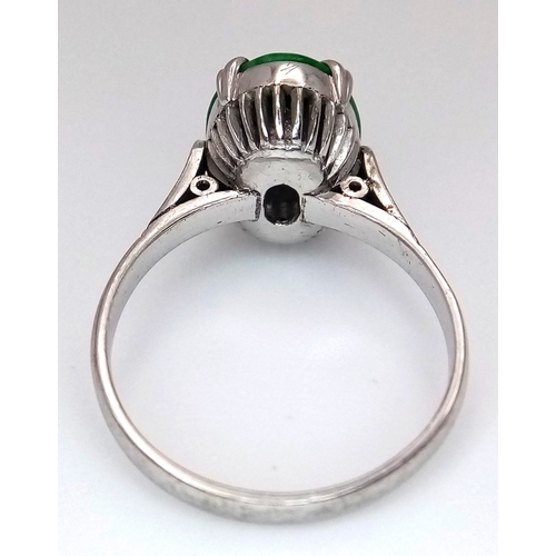 172 - An 18K White Gold Jade Oval Cabochon Ring. Size L. 3.06g. Ref -mt09.