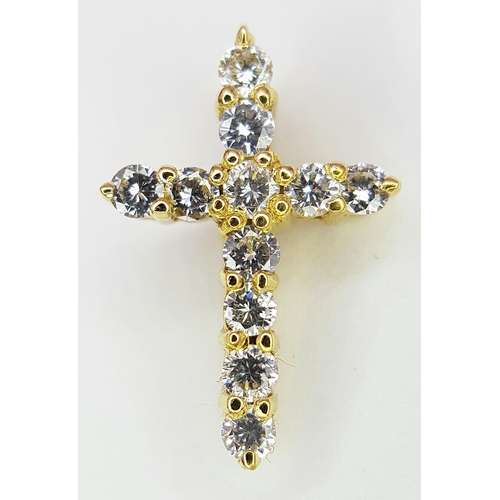 180 - AN 18K YELLOW GOLD DIAMOND SET CROSS PENDANT. 0.50CTW. 1.7G. 18MM x 12MM.
REF - JP4001.