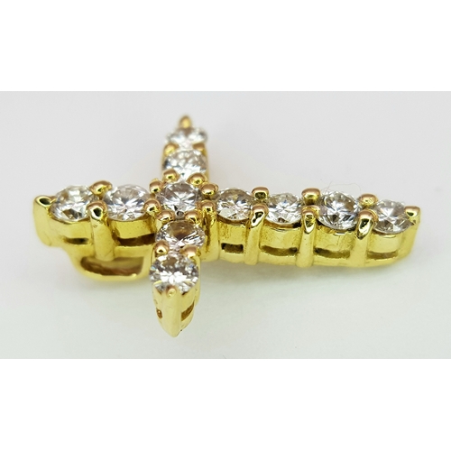 180 - AN 18K YELLOW GOLD DIAMOND SET CROSS PENDANT. 0.50CTW. 1.7G. 18MM x 12MM.
REF - JP4001.