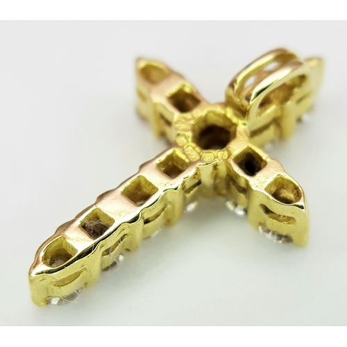180 - AN 18K YELLOW GOLD DIAMOND SET CROSS PENDANT. 0.50CTW. 1.7G. 18MM x 12MM.
REF - JP4001.