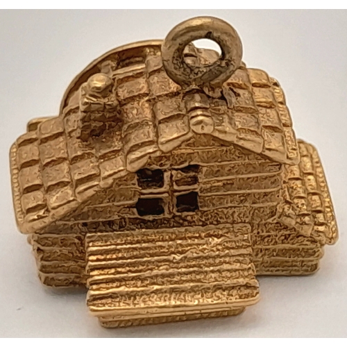 724 - A 9K Yellow Gold House Pendant. Movable water wheel! 12mm. 3.1g.