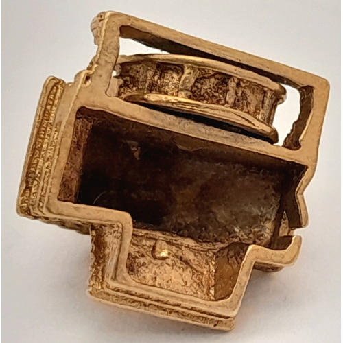 724 - A 9K Yellow Gold House Pendant. Movable water wheel! 12mm. 3.1g.