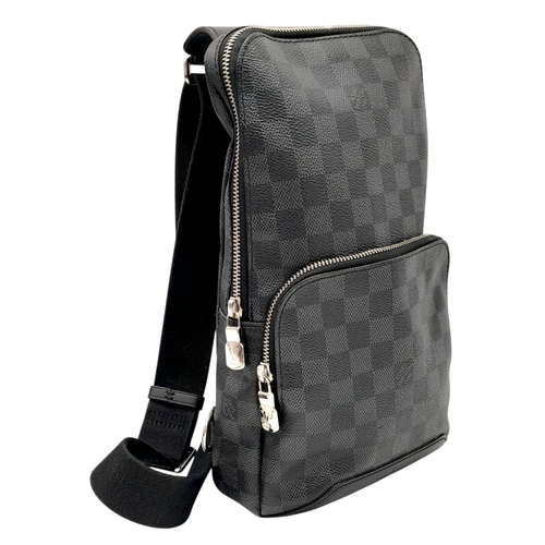 76 - A Louis Vuitton Damier Graphite Avenue Sling Bag. Black and grey Damier Graphite coated canvas exter... 
