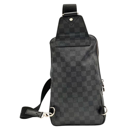 76 - A Louis Vuitton Damier Graphite Avenue Sling Bag. Black and grey Damier Graphite coated canvas exter... 