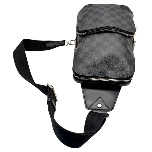 76 - A Louis Vuitton Damier Graphite Avenue Sling Bag. Black and grey Damier Graphite coated canvas exter... 