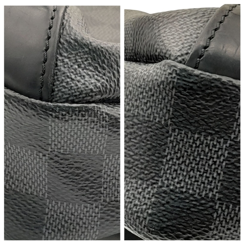 76 - A Louis Vuitton Damier Graphite Avenue Sling Bag. Black and grey Damier Graphite coated canvas exter... 