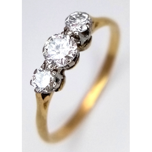 104 - AN 18K YELLOW GOLD 3 STONE DIAMOND RING. 0.40CTW. 2G. SIZE Q. 9788.