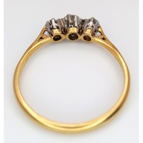 104 - AN 18K YELLOW GOLD 3 STONE DIAMOND RING. 0.40CTW. 2G. SIZE Q. 9788.