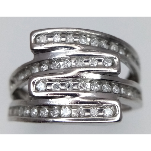 132 - A 9K WHITE GOLD DIAMOND RING. 0.33CTW. 4.8G. SIZE L.
SC4035.