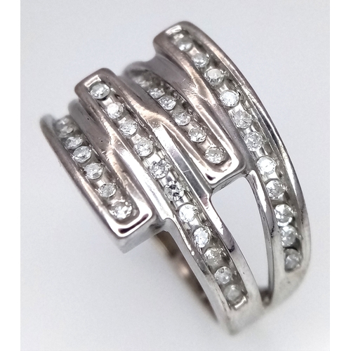 132 - A 9K WHITE GOLD DIAMOND RING. 0.33CTW. 4.8G. SIZE L.
SC4035.