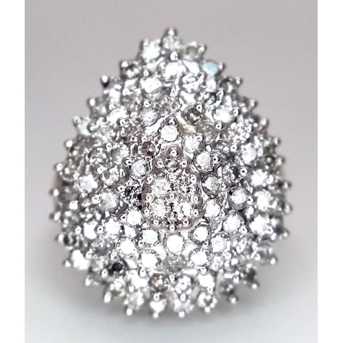40 - A 9K YELLOW GOLD PEAR SHAPE DIAMOND CLUSTER RING. 0.60CTW. 7.3G, SIZE M. REF 9667