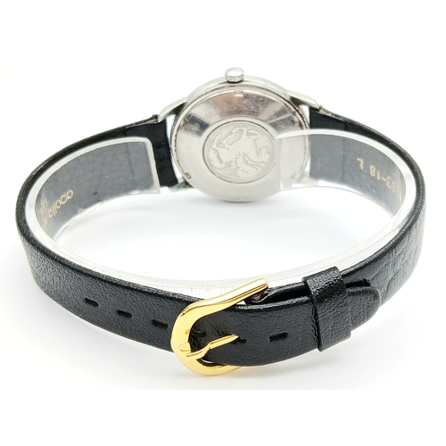 77 - Gentleman’s HAMILTON AUTOMATIC WRISTWATCH. Black leather strap . Circular Date window at 6 o’clock. ... 