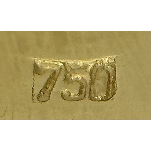 79 - An 18K Yellow Gold Emerald and Diamond Ring. A 2ct central oval cut Brazilian emerald is surrounded ... 