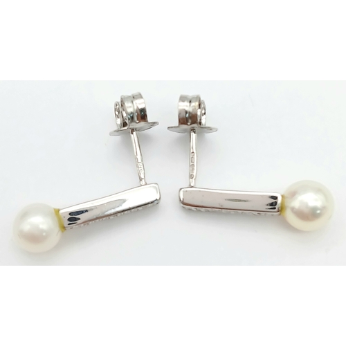 91 - Beautiful pair of 9 CARAT WHITE GOLD, DIAMOND and PEARL EARRINGS. Complete with WHITE GOLD BACKS. Fu... 