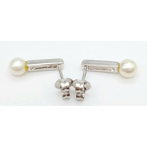91 - Beautiful pair of 9 CARAT WHITE GOLD, DIAMOND and PEARL EARRINGS. Complete with WHITE GOLD BACKS. Fu... 
