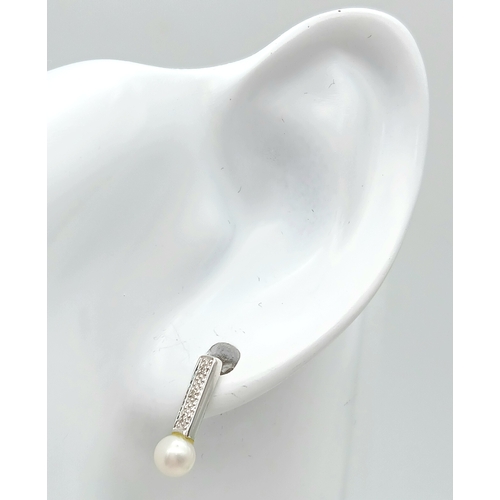 91 - Beautiful pair of 9 CARAT WHITE GOLD, DIAMOND and PEARL EARRINGS. Complete with WHITE GOLD BACKS. Fu... 