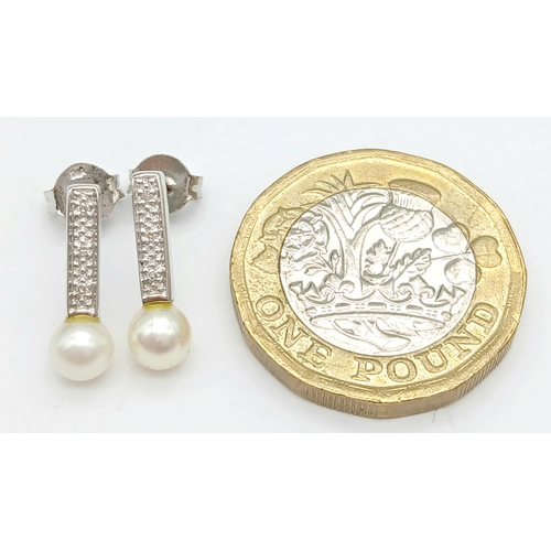 91 - Beautiful pair of 9 CARAT WHITE GOLD, DIAMOND and PEARL EARRINGS. Complete with WHITE GOLD BACKS. Fu... 