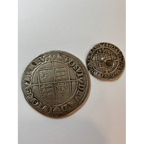 119 - 2 x ‘ELIZABETH I’  COINS. To include a 1561 SILVER HALF GROAT fair/fine (dent to middle) with some n... 
