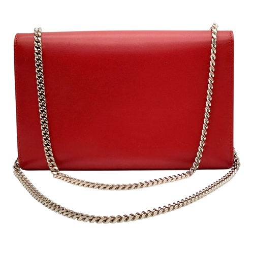 83 - A Saint Laurent Ruby Red Classic Kate Tassel Shoulder Bag. Leather exterior with silver-toned hardwa... 