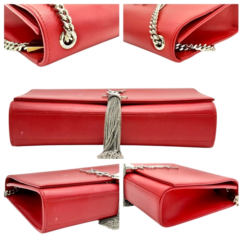 83 - A Saint Laurent Ruby Red Classic Kate Tassel Shoulder Bag. Leather exterior with silver-toned hardwa... 