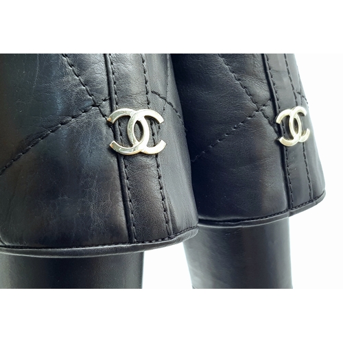 738 - A Pair of Chanel Black Quilted Leather Ankle Boots. Black leather featuring a fold-over cuff design,... 