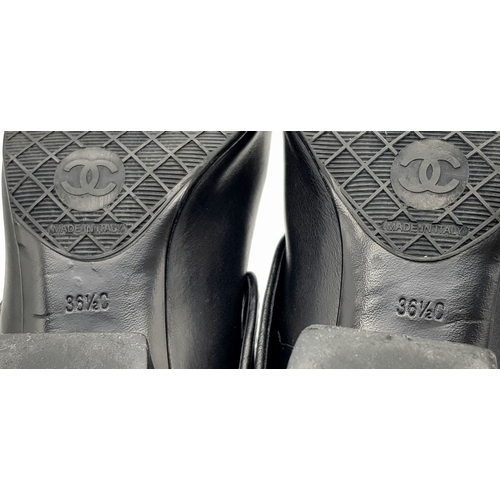 738 - A Pair of Chanel Black Quilted Leather Ankle Boots. Black leather featuring a fold-over cuff design,... 