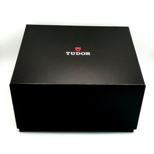 97 - A Tudor GMT Automatic Gents Watch. Model 79830RB. Brown leather strap. Stainless steel case - 42mm. ... 