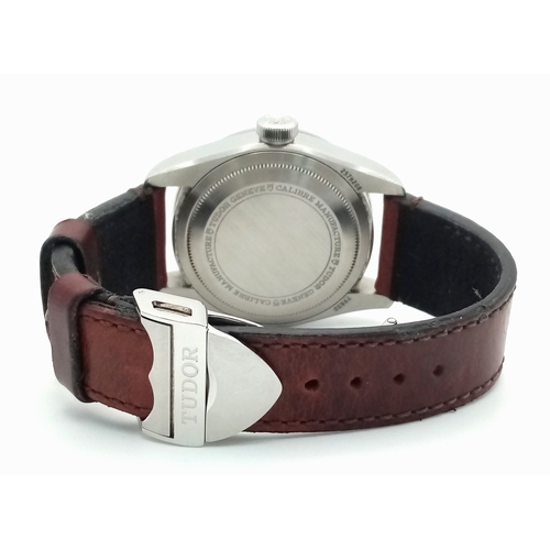 97 - A Tudor GMT Automatic Gents Watch. Model 79830RB. Brown leather strap. Stainless steel case - 42mm. ... 