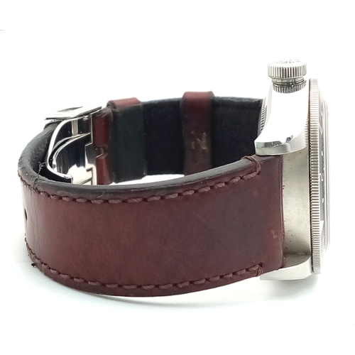 97 - A Tudor GMT Automatic Gents Watch. Model 79830RB. Brown leather strap. Stainless steel case - 42mm. ... 