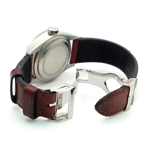 97 - A Tudor GMT Automatic Gents Watch. Model 79830RB. Brown leather strap. Stainless steel case - 42mm. ... 