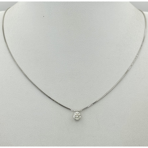 167 - A Victor Azzopardi 18K White Gold Diamond Pendant and Chain. 0.55ct VS clarity, round brilliant cut ... 