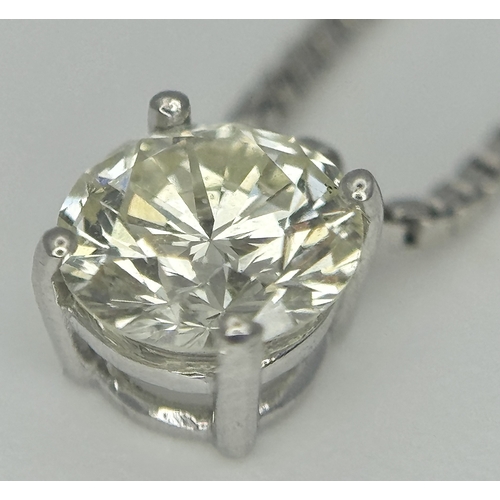 167 - A Victor Azzopardi 18K White Gold Diamond Pendant and Chain. 0.55ct VS clarity, round brilliant cut ... 