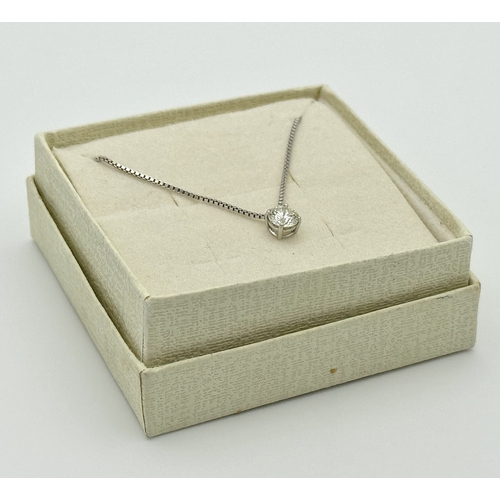 167 - A Victor Azzopardi 18K White Gold Diamond Pendant and Chain. 0.55ct VS clarity, round brilliant cut ... 