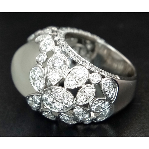 121 - A Ritz of London 18K White Gold, Diamond and Moonstone Dome Dress Ring. An 8ct hypnotising oval cut ... 