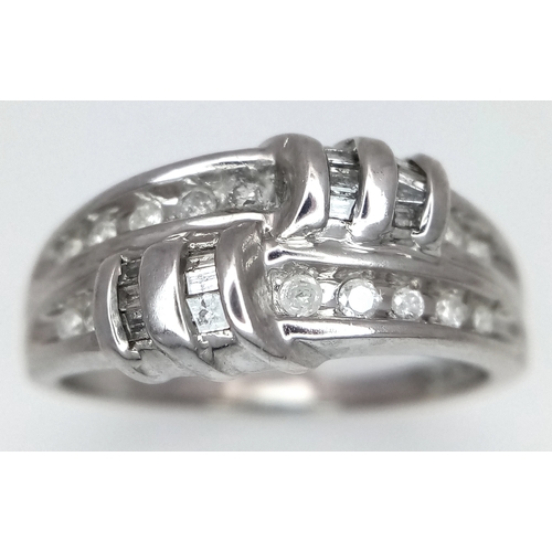 139 - A 14K WHITE GOLD DIAMOND SET RING. 3.5G. SIZE P. REF - 4057.