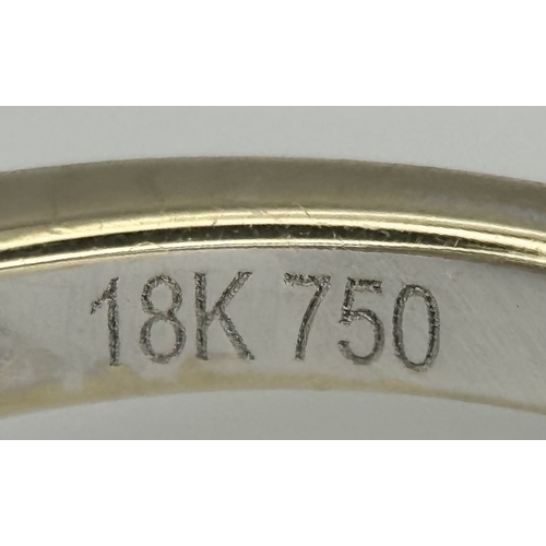 72 - An 18K White Gold, Diamond and Sapphire Swirl Ring. A 0.75ct round cut sapphire is the eye in a diam... 