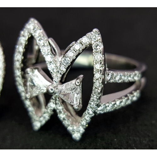 86 - A 950 Platinum and Diamond Set of Earrings and Ring in  Fancy Angel Wings Form. Trillion and round b... 