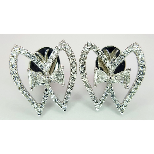 86 - A 950 Platinum and Diamond Set of Earrings and Ring in  Fancy Angel Wings Form. Trillion and round b... 