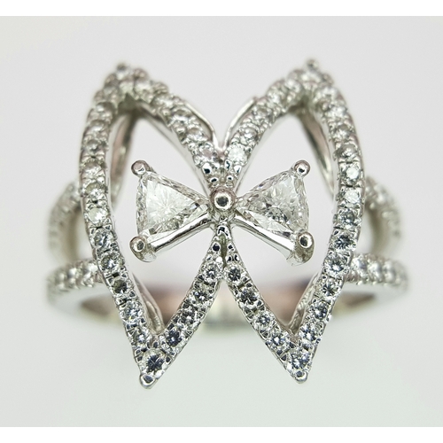 86 - A 950 Platinum and Diamond Set of Earrings and Ring in  Fancy Angel Wings Form. Trillion and round b... 