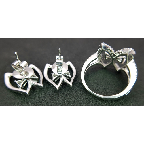86 - A 950 Platinum and Diamond Set of Earrings and Ring in  Fancy Angel Wings Form. Trillion and round b... 